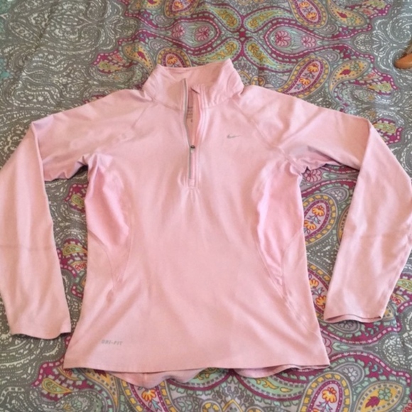 baby pink nike shirt